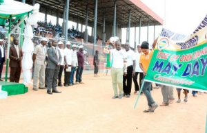 Photo: Aregbesola Celebrates May-Day With Workers Osun's Governor Rauf Aregbesola, left, at the stadium in solidarity with workers on May-Day...