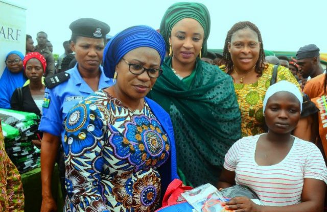 From the left…Wife of Governor of Osun, Mrs Sherifat Aregbesola, Wife of Borno State Deputy Governor, Hajia Hansatu Zana who represented Hajia Aisha, wife of President Buhari, North West Zonal Coordinator for Hajia Aisha Foundation, Mrs. Bamigbose and a beneficiary, during the distribution of Mama kits to beneficiaries, at the Flagg off ceremony held at Isale Agbara, Osogbo,State of Osun on Tuesday…