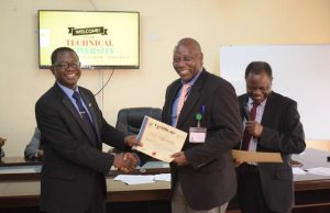 Tech-U Holds Capacity Building Workshop, Trains Admin Officers, Drivers The Vice-Chancellor, Professor Ayobami Salami (left) presenting a certificate to Mr. Dipo Fagbamila after the workshop