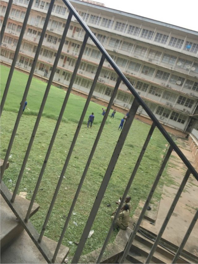 ...prisoners working on UCH's bushy environment while prisons officials watch over them...on Wednesday...
