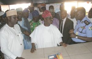 Ajimobi Visits Bodija Market, Burnt Police Station, Says Perpetrators Of Mayhem’ll Be Prosecuted Governor Abiola Ajimobi of Oyo State (middle), the Commissioner of Police, Oyo State Police Command, Mr. Abiodun Odude (right) and the Chairman, Aare Latosa Local Council Development Area (LCDA), Mr. Adekunle Oladeji during the governor's inspection visit to the police station at Bodija Market…