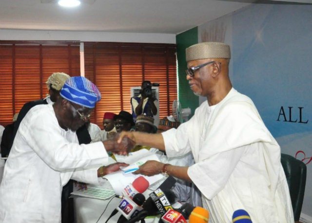 L-R: Oyo State Chairman of the All Progressives Congress, Chief Akin Oke; with the National Chairman of the party, Chief John Odigie-Oyegun, during Oke's inauguration for a fresh term, at the party's national headquarters, Abuja... on Monday