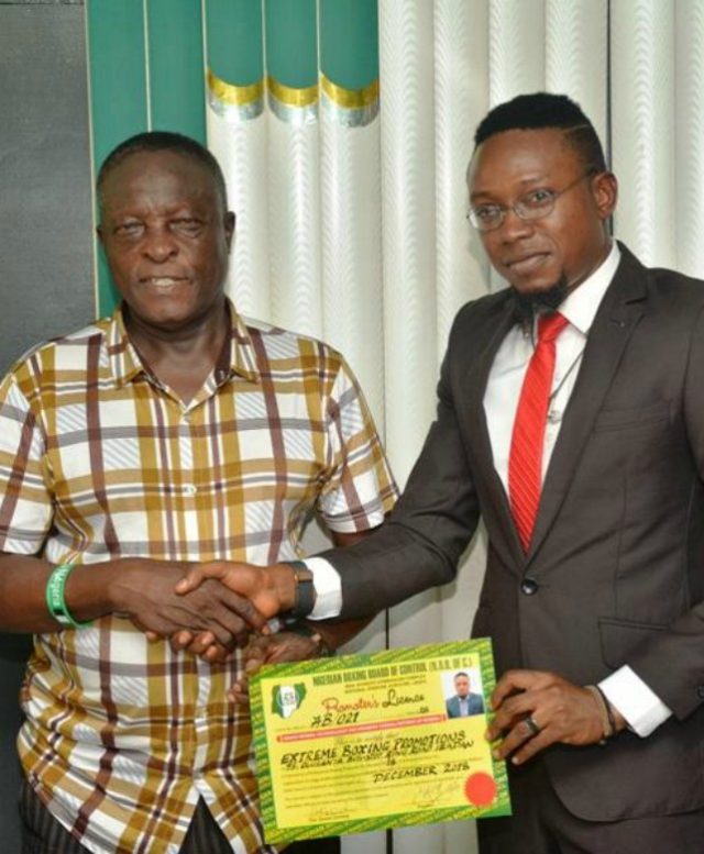 Dr. Rafiu Ladipo, the President, Nigerian Boxing Board of Control (NBBofC), left, presenting professional boxing license to the Ibadan based promoter, Extreme Boxing Promotions, Mr. Ayo Olaniyi…