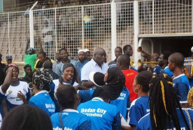 Mr Rasheed Balogun, 3SC's GM, middle, with the students of Ibadan City Polytechnic...at the Lekan Salami Stadium...