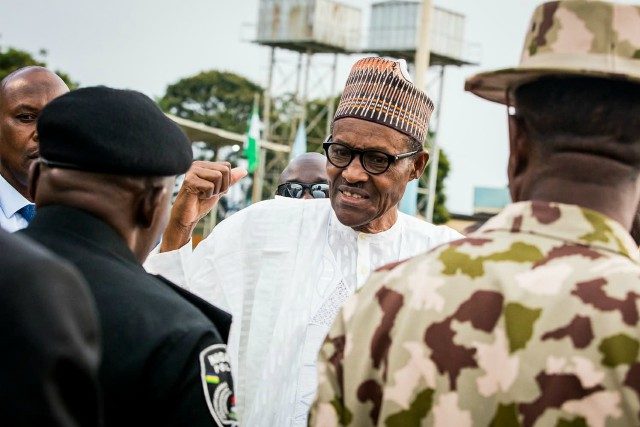 President Muhammadu Buhari addressing security chiefs on arrival in Jos, on Tuesday...
