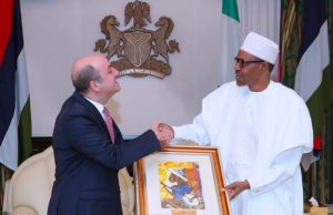 Buhari Assures Ambassadors Of Continuity In Mutually Beneficial Relationships President Muhammadu Buhari, right, with one of the Ambassadors...
