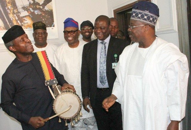 Vice President Yemi Osinbajo, left, with others in Ibadan...