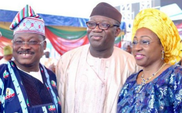 Governor Abiola Ajimobi of Oyo State, left, with Dr Kayode Fayemi and his wife, Bisi…