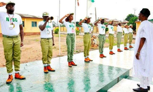 Osun’s Governor Rauf Aregbesola (right), with Youth Corpers…during the official opening and Swearing-in Ceremony of 2018 Batch B of NYSC at the Orientation Camp Ede, State of Osun, on Thursday…