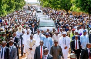 Eid-El-Adha: Buhari Treks 800meters After Prayers President Muhammadu Buhari, middle, trekking with his admirers...