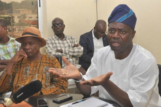 Engr Seyi Makinde addressing the news men during the media chat…with his is Chief Bayo Lawal and others…