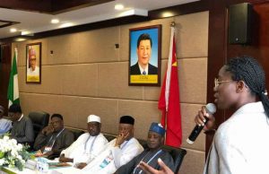 Chinese FA Ready To Host Women’s Football Clinic In Lagos Asisat Oshoala...right, addressing government officials...