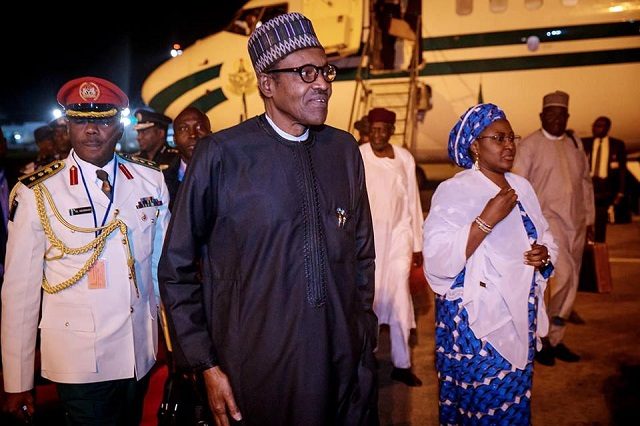 President Muhammadu Buhari and wife, Aisha on arrival in Abuja, Nigeria's capital city...
