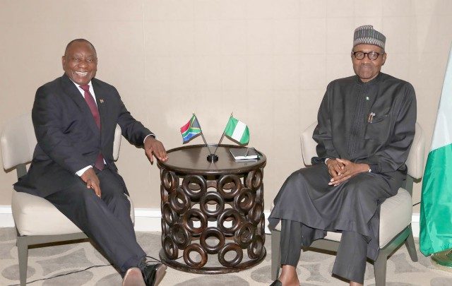 President Muhammadu Buhari, right, with President of South Africa, Mr Cyril Ramaphosa…