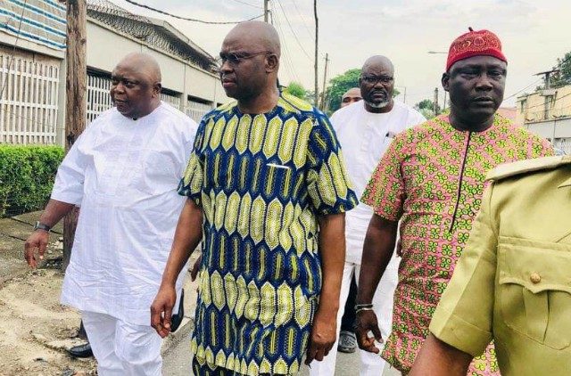 Ex-Governor Ayodele Fayose, middle, being escorted to freedom by close associates after his release on Monday...