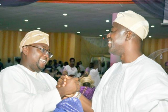 APC's Adebayo Adelabu, left, with Engineer Seyi Makinde of PDP...at the event...
