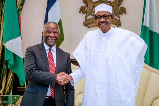 President Buhari and Mbeki, right...