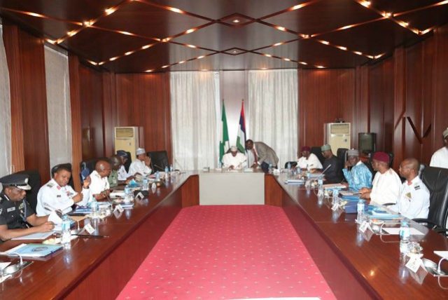 President Muhammadu Buhari with the Heads of the National Security Council...during the meeting...