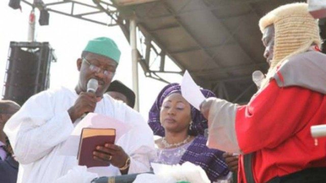Dr Kayode Fayemi, the new governor of Ekiti State being sworn in...earlier on Tuesday...