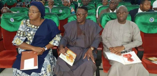 L-R: Mrs Omolewa Ahmed, Governor Abdulfatah Ahmed and Alhaji Isiaka Sola Gold at the burial service in Lagos on Friday...