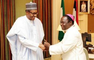No President In The World Can Be As Irresponsible As The Nigerian President, Says Kukah Matthew Hassan Kukah, right, with President Muhammadu Buhari during the cleric's visit to Aso Rock, Abuja, sometime ago...