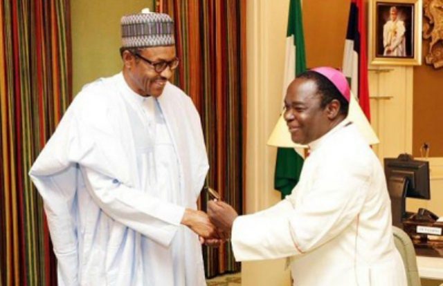 Matthew Hassan Kukah, right, with President Muhammadu Buhari during the cleric's visit to Aso Rock, Abuja, sometime ago...