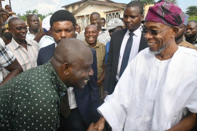 Governor State of Osun, Ogbeni Rauf Aregbesola (right) and one of the deceased comedian’s children, Mr Muyiwa Adejumo during the visit…