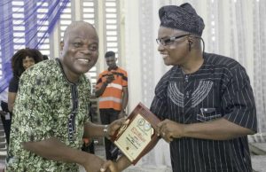 How Agboola, PMParrot’s Publisher Was Honoured By University Of Ibadan’s Sultan Bell Hall Mr Olayinka Agboola, right, receiving his award at the event...