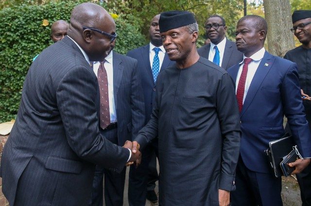 VP Yemi Osinbajo, SAN, with Professor Wale Adebanwi, Director of the African Studies Centre, left…Laolu Akande looks on from the right…