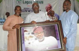Day Seyi Akinwunmi Was Honoured By Lagos SWAN Barrister Seyi Akinwunmi being presented with a giant photo frame at the event...