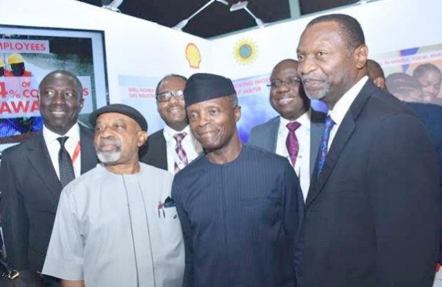 L-R: Chairman, Nigeria Economic Summit Group, Mr. Asue Ighodalo; Minister of Labour and Employment, Dr. Chris Ngige; Managing Director, Shell Nigeria Gas, Mr. Ed Ubong; Vice President, Prof. Yemi Osinbajo; Managing Director, Shell Nigerian Exploration and Production Company, Mr. Bayo Ojulari; and Minister of Budget and National Planning, Senator Udo Udoma, during an inspection of the exhibition booth of Shell Companies in Nigeria…