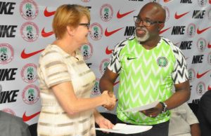 NFF Pens New, Improved NIKE’s Contract Amaju Pinnick, right, with a representative of NIKE...at the event...