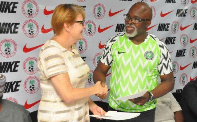 Amaju Pinnick, right, with a representative of NIKE...at the event...