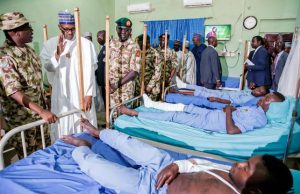 Buhari Visits Wounded Soldiers, Orders That Boko Haram Threat Must Be Ended President Muhammadu Buhari with some of the wounded Metele soldiers