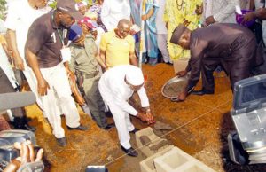 Ilesa New Town: Day Aregbesola Revived Rural Urbanisation Aregbesola laying the foundation stone of the estate…with him is Arc Muyiwa Ige (left)