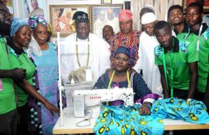 Kayrom Lee, Olubadan Parley To Empower Youths Ambassador Romoke Ayinde, seated, displaying skills to the Olubadan of Ibadanland, Oba Saliu Adetunji and others...