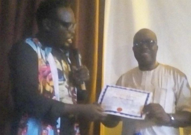 The National General Secretary of PMAN, Boniface Itodo (Aitabonny), left, presenting the Certificate of Return to the new governor, Evangelist Taiwo Omotunde after winning the election…