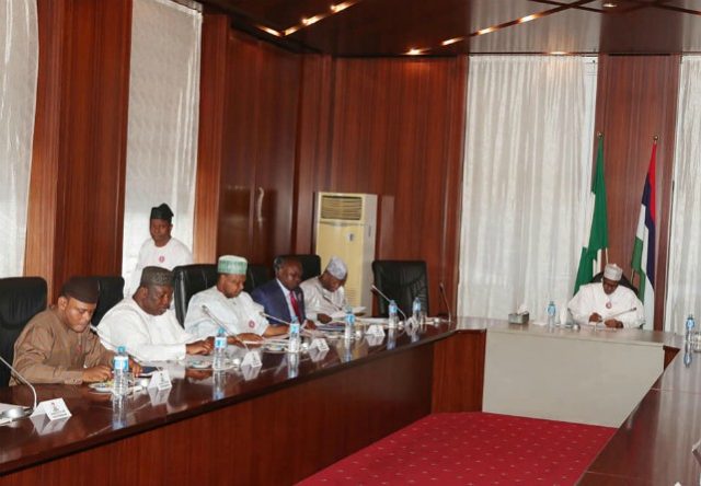 President Muhammadu Buhari, right, with some of the governors during the meeting...
