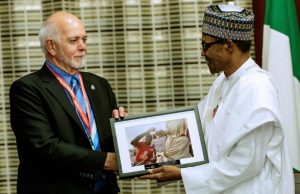 Buhari Bags Polio Champion Award President Muhammadu Buhari, right, with Rotary International President, Mr Barry Rassin...