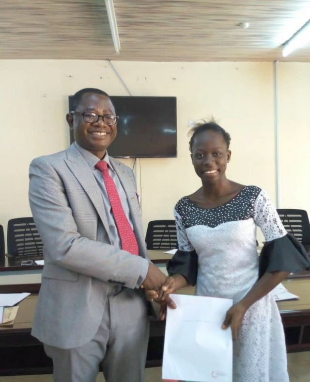 Professor Ayobami Salami presenting a letter of award to Miss Adedamola Adegoke, one of the pioneer beneficiaries of the Josephus Foundation Scholarship on Tuesday…