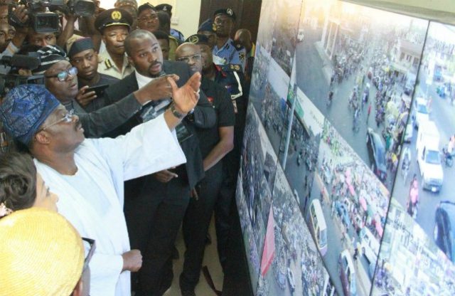 L-R: Oyo State Governor, Senator Abiola Ajimobi; Chairman, Oyo State Security Trust Fund/All Progressives Congress governorship candidate, Chief Adebayo Adelabu; and a Security Expert, Mr Francis Anyaebosi, during the inauguration of Phase One of the Safe City Control Centre, in Ibadan...