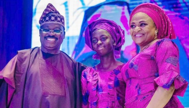 L-R: Oyo State Governor, Senator Abiola Ajimobi, the best performing female student from a public school, Miss Itunuoluwa Joel; and wife of the governor, Dr (Mrs) Florence Ajimobi, during the presentation…
