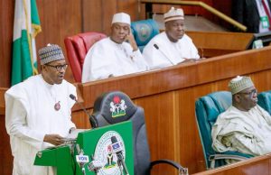 Budget Presentation Drama: For ‘Embarrassing’ Buhari, APC Chides PDP Lawmakers President Muhammadu Buhari, left...presenting the budget...check out Dr Bukola Saraki's look here...