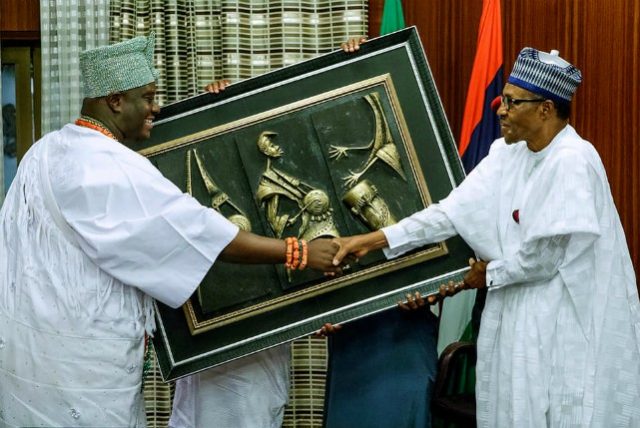 The Ooni of Ife, Oba Adeyeye Ogunwusi, left, with President Muhammadu Buhari...