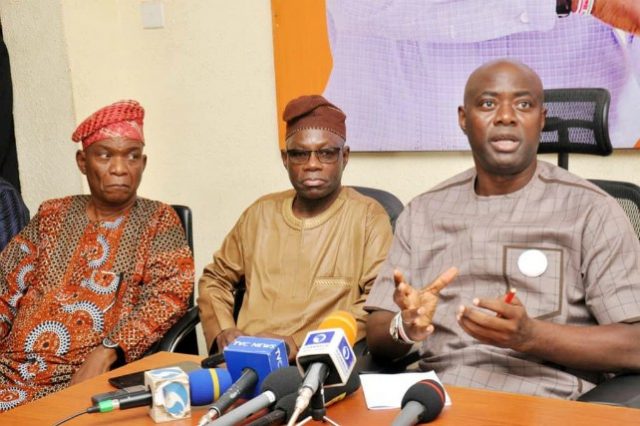 PDP’s gubernatorial candidate, Engr Seyi Makinde (right) addressing the media while Oyo south senatorial district Senator-elect, Dr Kola Balogun and Director General Seyi Makinde campaign, Chief Bayo Lawal, left…look on…