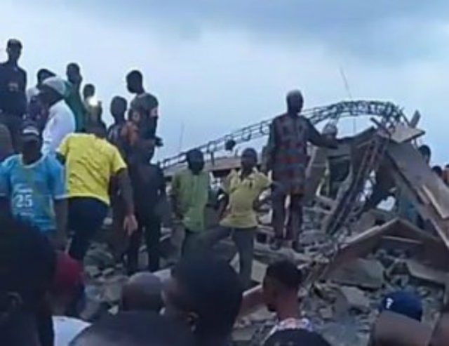 ...the collapsed building in Ibadan...on Friday...