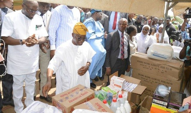 Governor State of Osun, Mr Gboyega Oyetola (Center); Minister of Health, Dr Isaac Adewole; Osun former Commissioner for Health, Dr. Rafiu Isamot (left) and others…during the event…