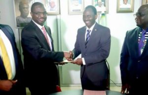 When Odu’a Partnered Iconic City For Ibadan Estate Project Group Managing Director/CEO, Odu'a Investment Company Limited, Mr Adewale Raji (2nd right) exchanging the signed agreement in respect of The development of Westlink-Iconic Estate in Ibadan, Oyo State with the Chief Executive Officer, Chapter Four Estate Management Limited (CFEML), Mr. Shamsideen Ogunmuyiwa while Financial Director, CFEML, Mr. Niyi Raimi (Left) and Group Head, Property Development and Management, Odu'a, Engr. Tope Arowolo look on