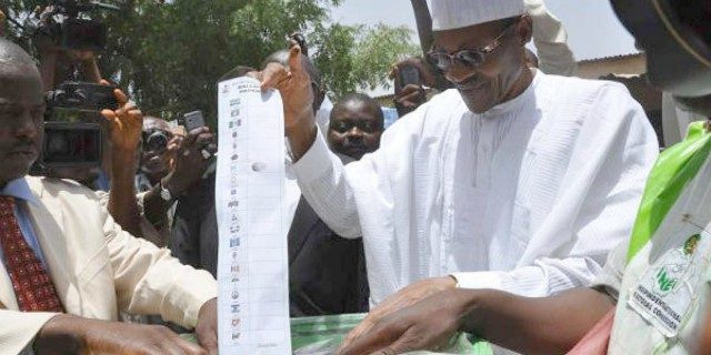 ...President Muhammadu Buhari...casting his vote early on Saturday...