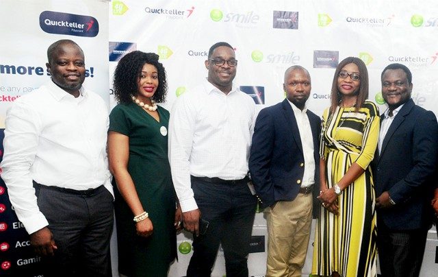L-R: Head, Business Development, Interswitch Financial Inclusion Services, OnyekaUkpaka andDivisional CEO, Interswitch Financial Inclusion Services, Titilola Shogaolu withGbolahan Thomas, Head, Legal & Regulatory Services, Lotanna Anajemba, Head, Brands & Communications, AdenikeAjayi, Head, Retail Business, Tunde Baale, Ag. GM Sales & Distribution, all of Smile Nigeria, at the MOU signing ceremony held in Lagos between Interswitch and Smile Nigeria …recently